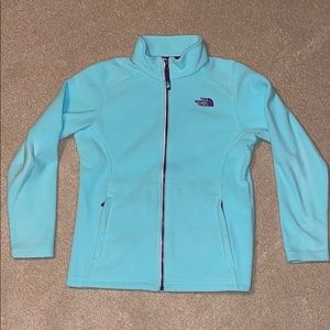 Girls large blue zip up North Face fleece.
